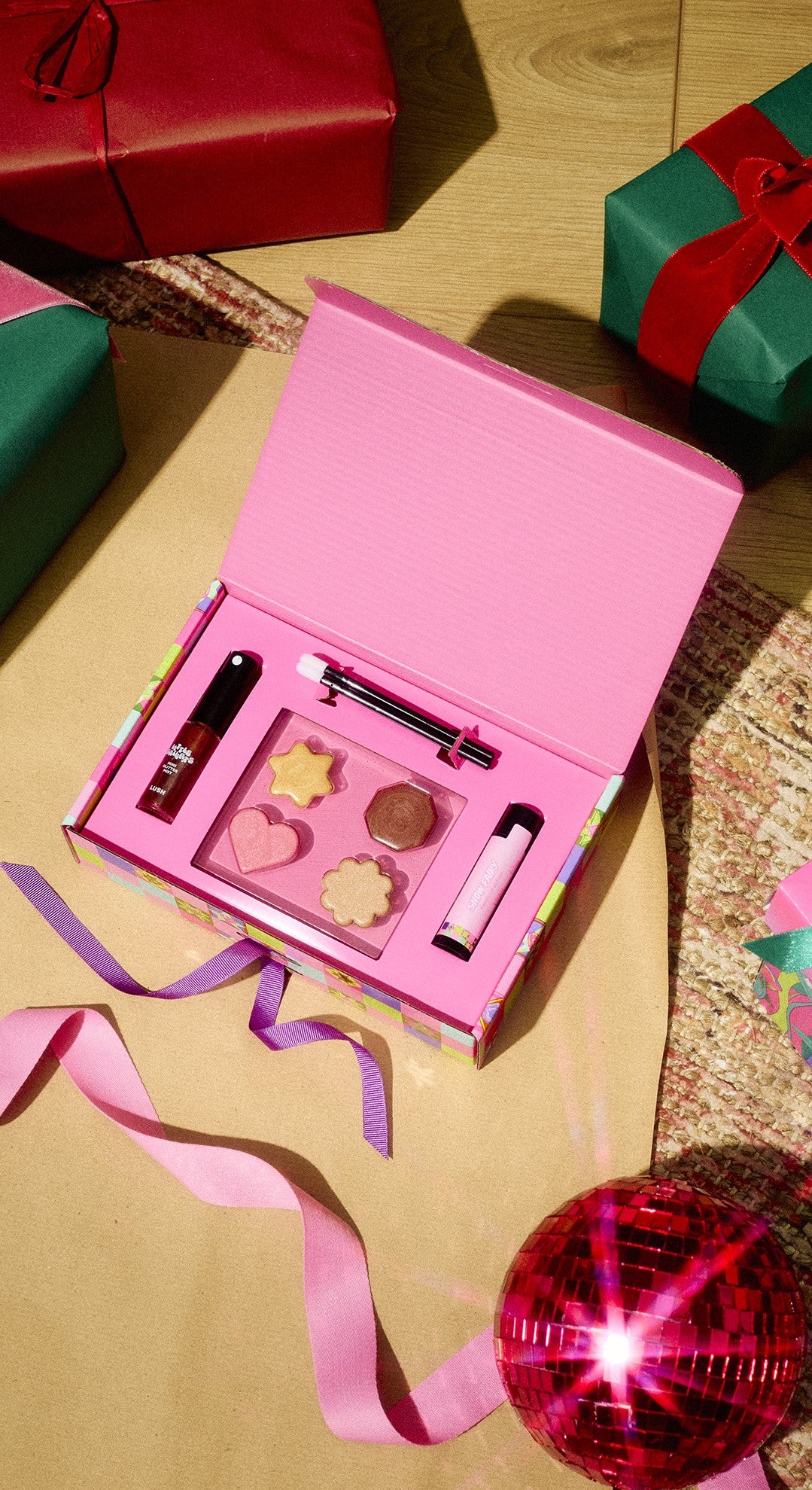 Open Snow Fairy Makeup Set with a pink interior, makeup palette, applicators and small cosmetics.