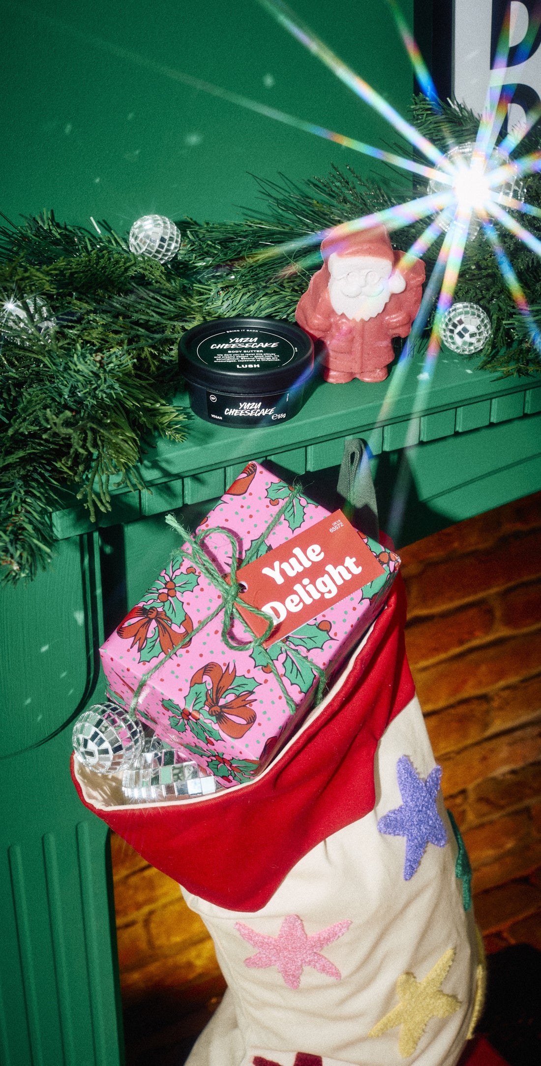 Yule Delight wrapped gift in a Christmas stocking, with a pot and solid product on the mantelpiece above.