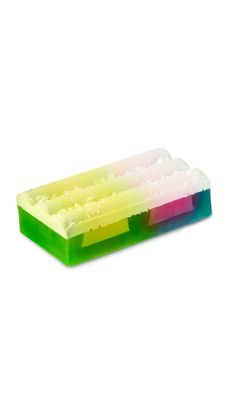 A colourful rectangular-shaped lush soap piece.