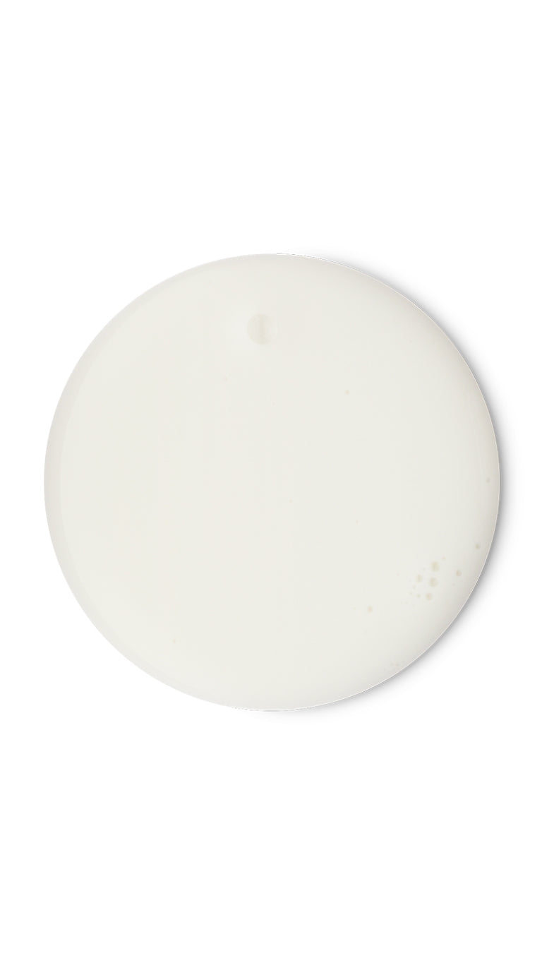 A white circular swatch of a lush seasonal shower gel.