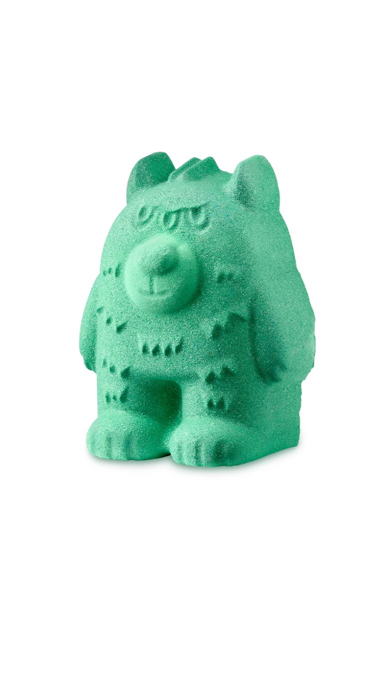 A green monster bear shaped bath bomb