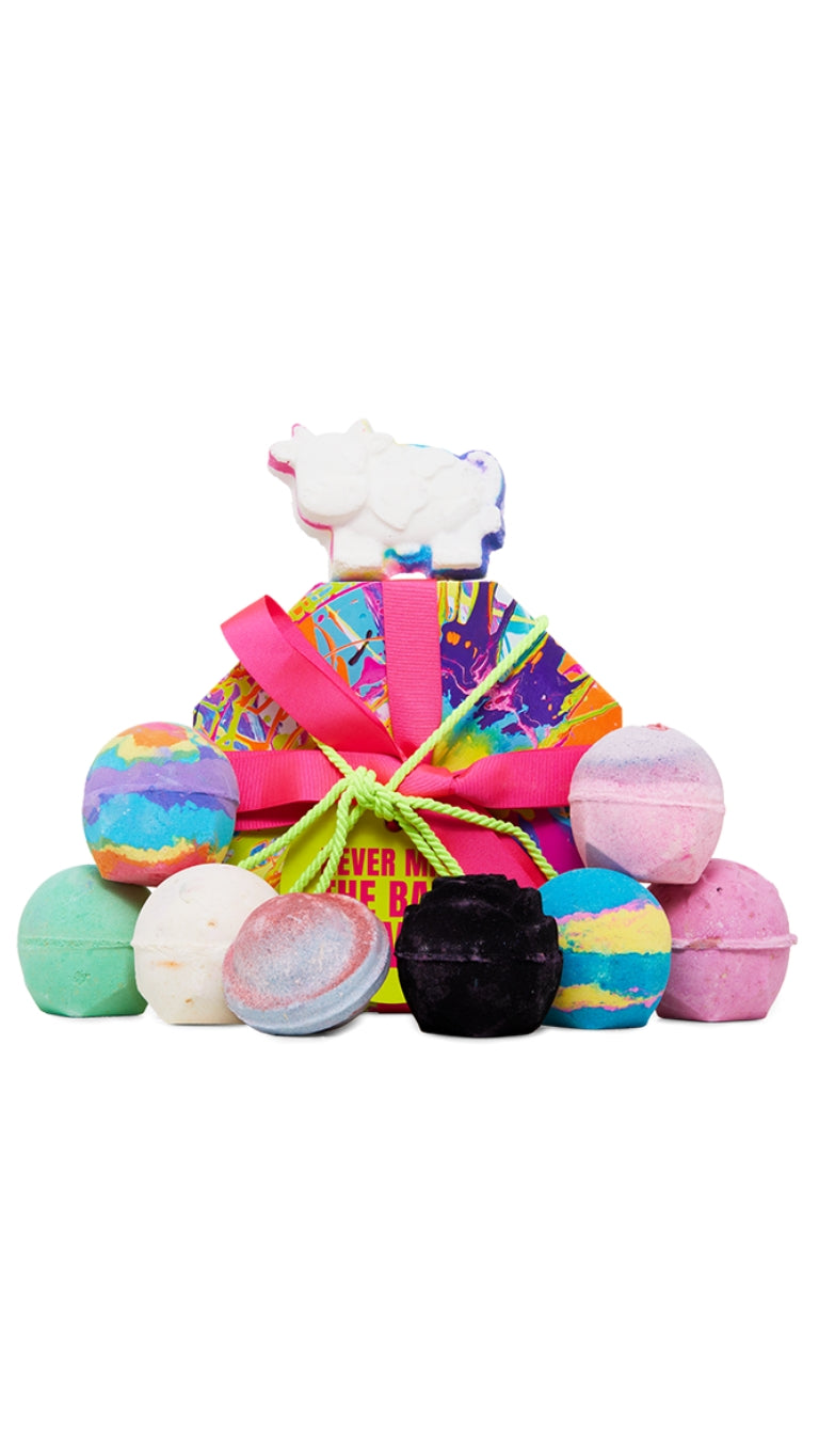 Never Mind The Bath Bombs gift featuring a selection of colourful bath bombs arranged around a hat box gift.