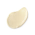 A cream tear-shaped swatch of a lush body lotion that smells like olive oil. 