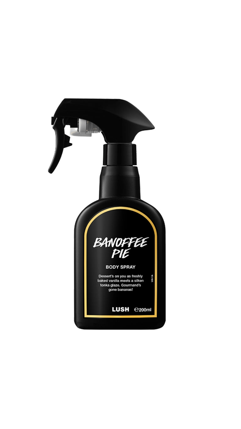 A tall black spray bottle with a black label bordered in yellow, featuring the product name printed in white.