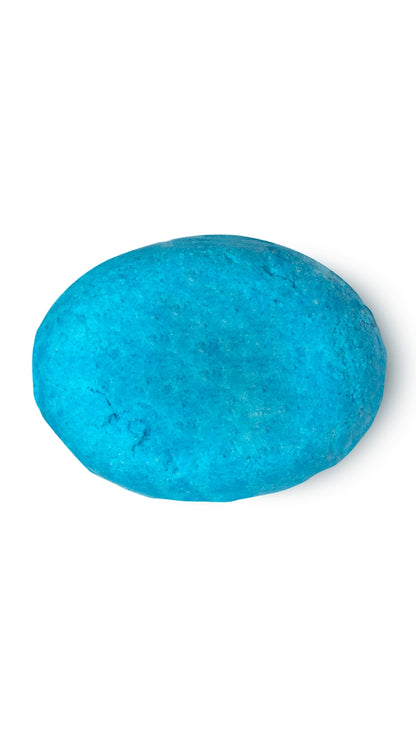 A blue oval-shaped lush conditioner bar that smells like sea salt. 
