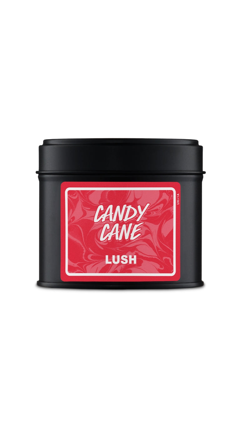 A black tin with the red label on it. 