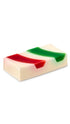 A red, green and white rectangular shaped soap piece. 