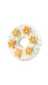 A circular white and old star shaped christmas wreath bubble bar. 