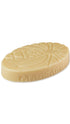 A cream coloured lush massage bar that smells like coconut. 
