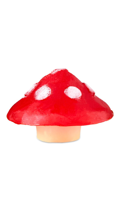 A red mushroom-shaped soap piece. 