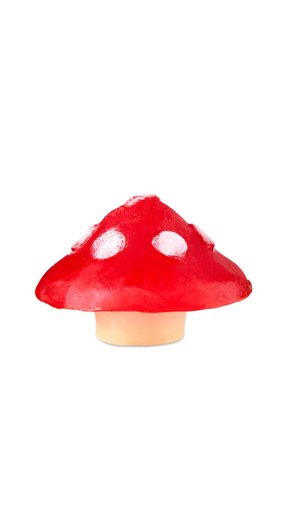 A red mushroom-shaped soap piece. 