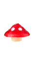 A red mushroom-shaped soap piece. 