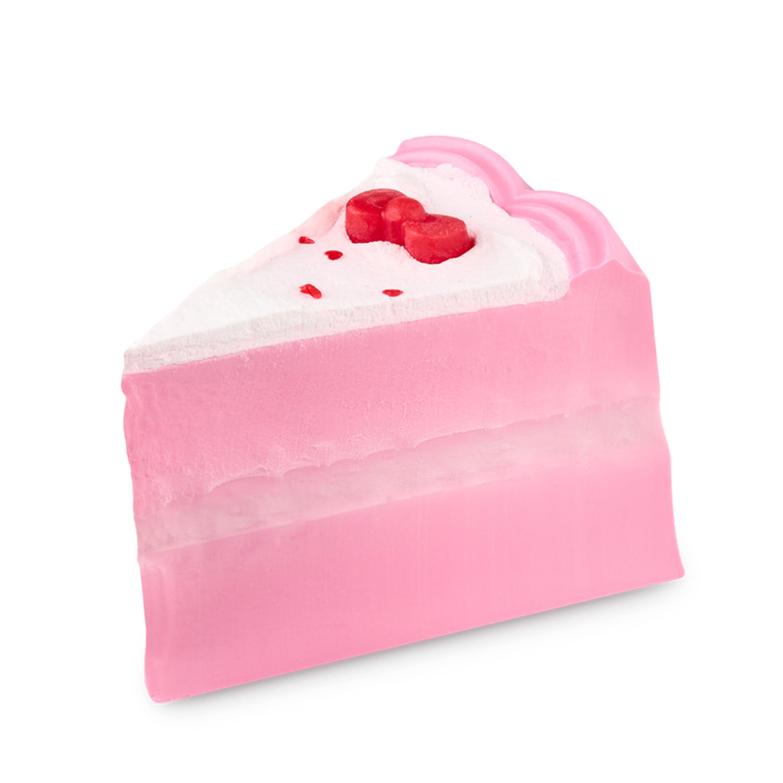 Pink cake-slice shaped soap piece with a red bow and white top.