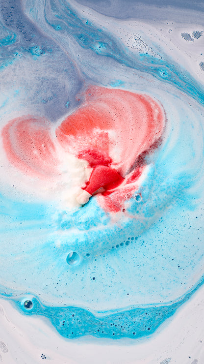 Jet Ski bath bomb fizzing into red, white and bright blue foam.