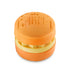 Orange macaron-shaped bath bomb with a nourishing bath oil layer in the center.