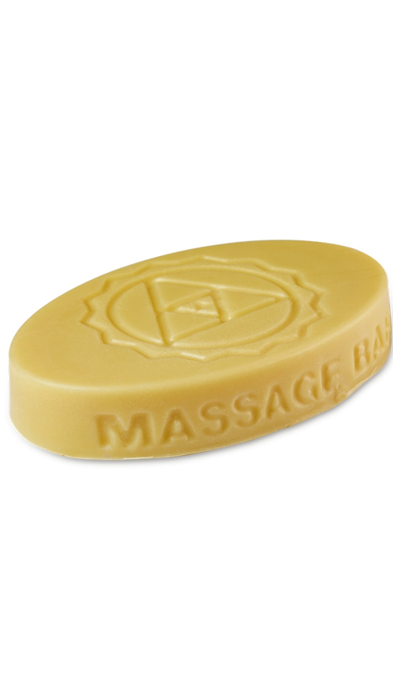 A cream oval-shaped lush massage bar that smells like citrus. 