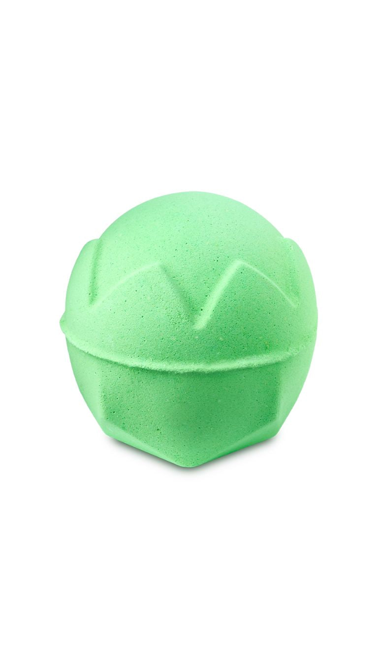 A green circular lush bath bomb 