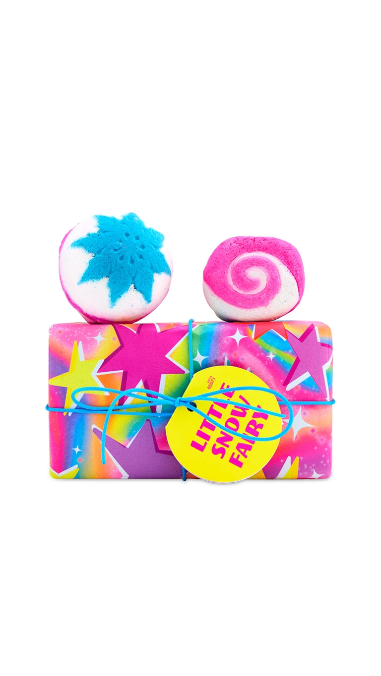 Little Snow Fairy gift featuring Snow Fairy bath bomb and bubble bar, displayed on top of a star-wrapped gift box. 
