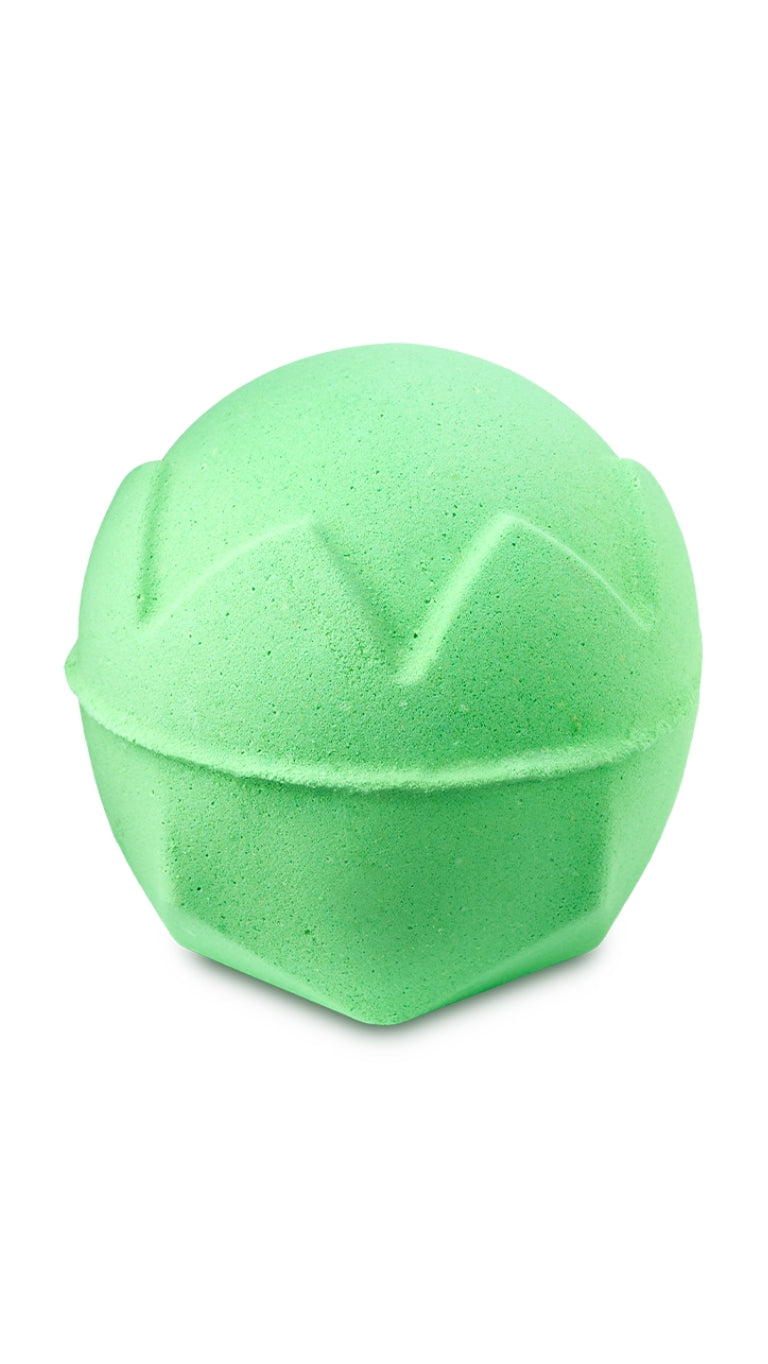 A green circular lush bath bomb