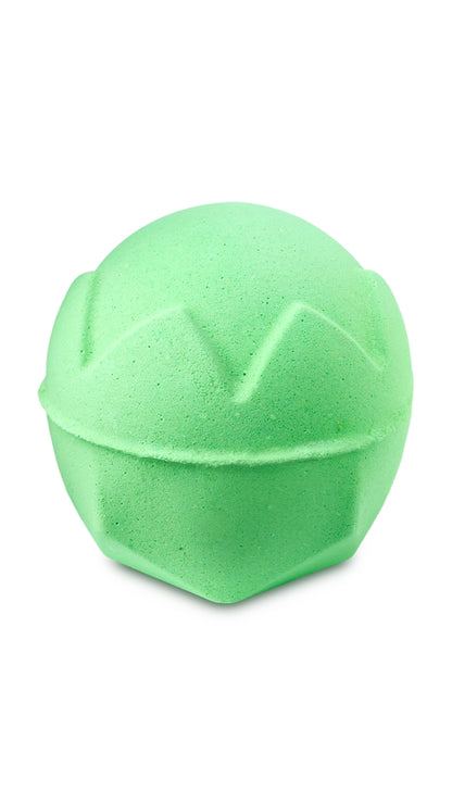 A green circular lush bath bomb 