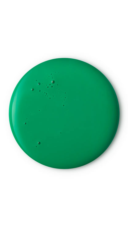 A green circular swatch of a lush seasonal shower gel. 