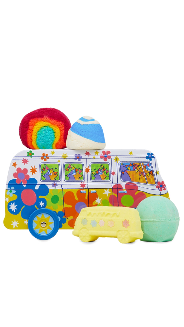Magic Bus gift featuring a colourful camper van gift box with a selection of bath bombs and bubble bars. 