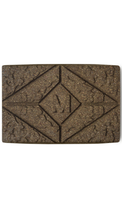 A brown rectangular block of lush henna hair dye. 