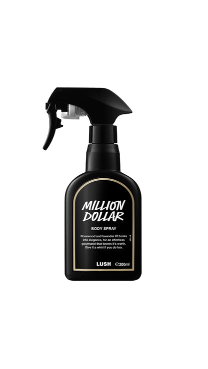 A tall black spray bottle with a black label bordered in yellow, featuring the product name printed in white.