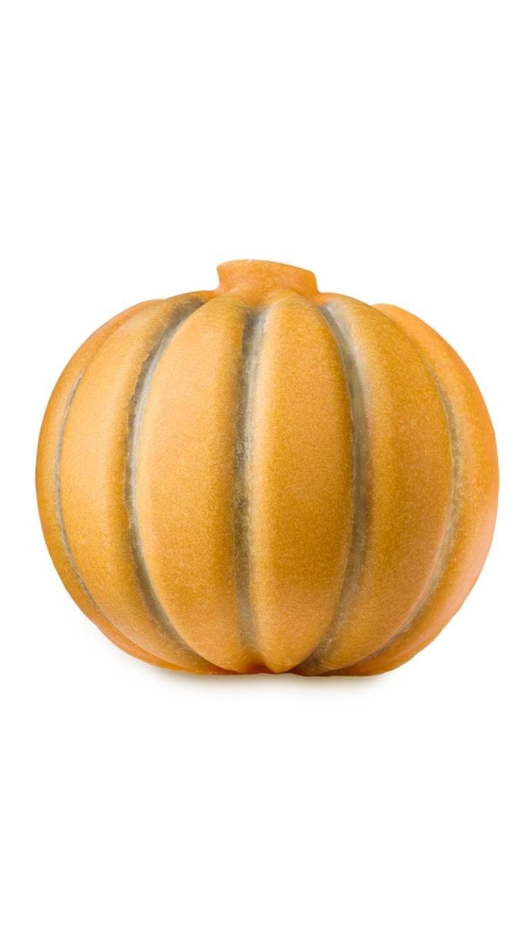 An orange pumpkin-shaped body butter and scrub. 