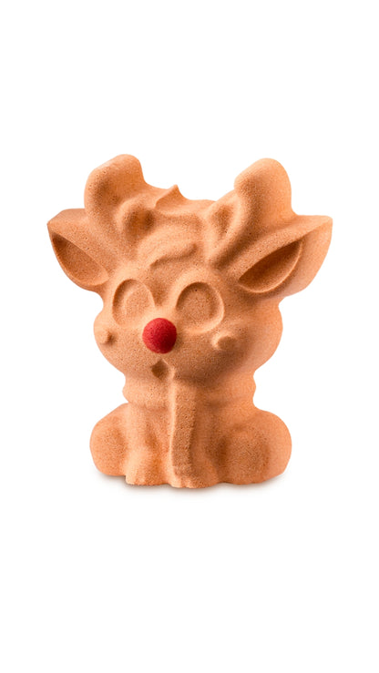 A brown reindeer-shaped lush bath bomb with a red coloured nose. 