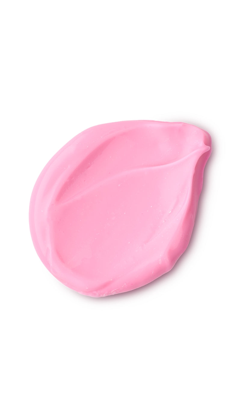 A pink tear-shaped swatch of a lush body lotion. 