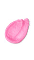 A pink tear-shaped swatch of a lush sugar scrub 