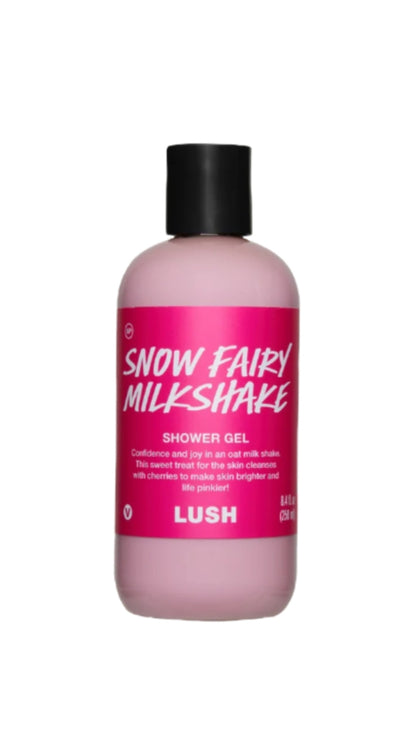 A clear bottle of pink Snow Fairy Milkshake Shower Gel with a black cap and bright pink label.