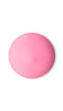 A pink circular swatch of a lush shower gel. 