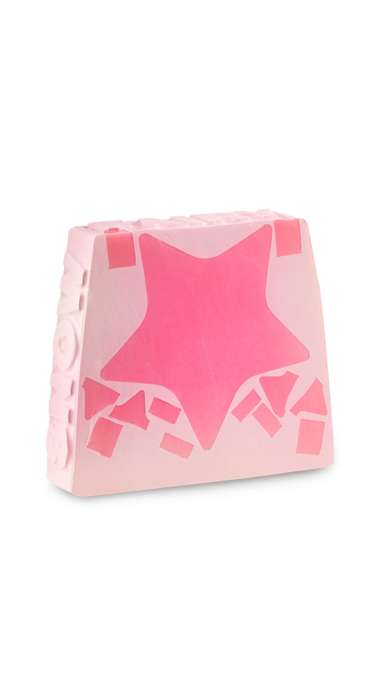 A pink square shaped soap piece with a large star in the middle. 