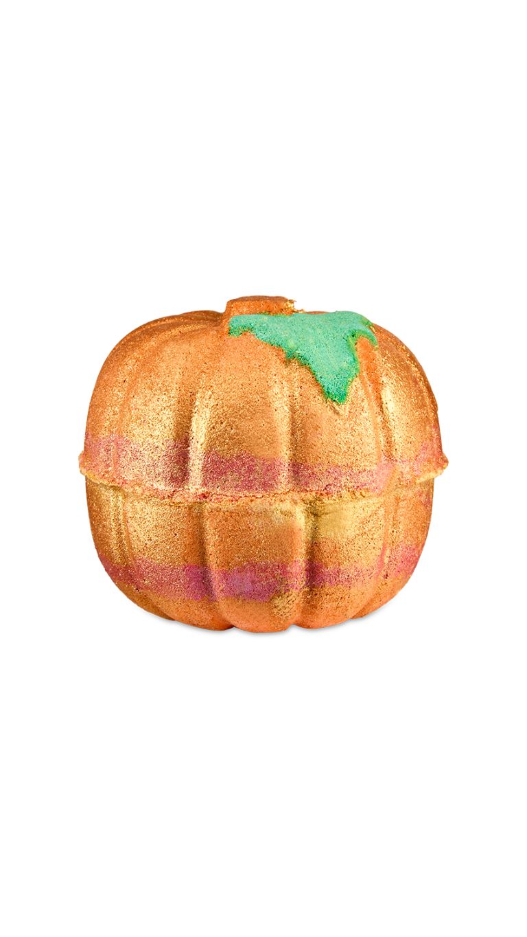 An orange circular pumpkin-shaped bath bomb. 