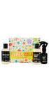 Super Milk body spray gift set featuring two bottles of Super Milk perfume and one bottle of Super Milk glitter mist displayed in front of a colourful gift box.