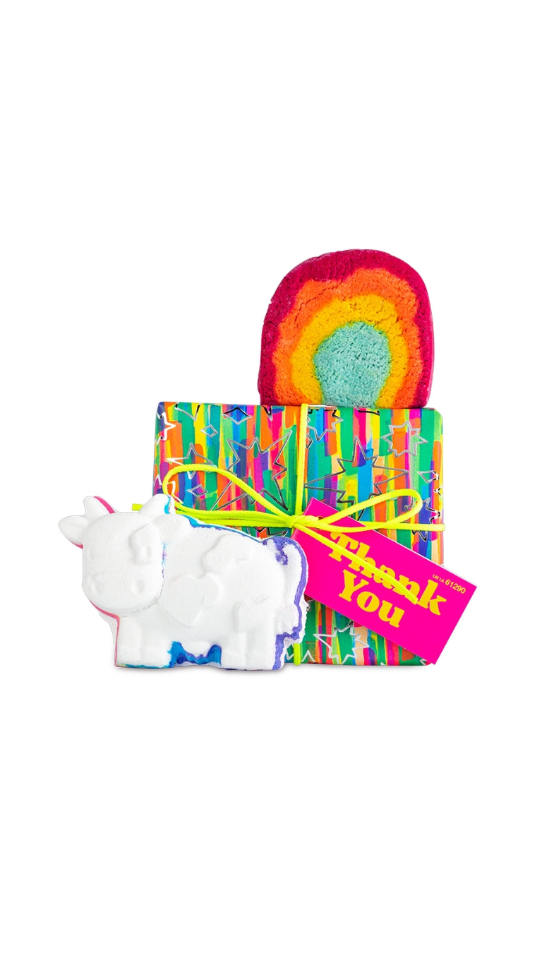 Thank You gift featuring a rainbow bubble bar and a cow-shaped bath bomb presented with a brightly wrapped gift and gift tag.