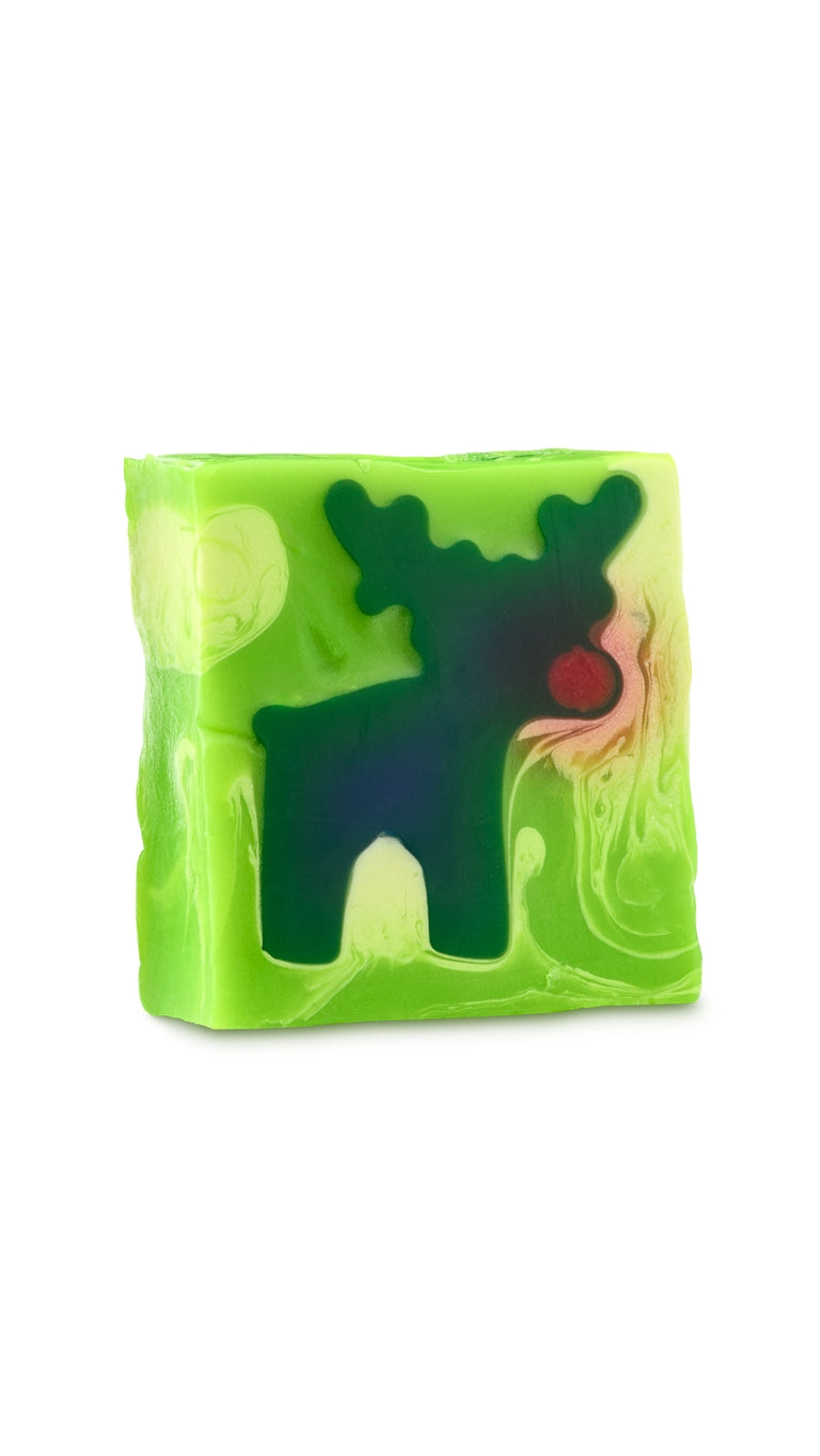 A green square-shaped soap piece with a reindeer in the center. 