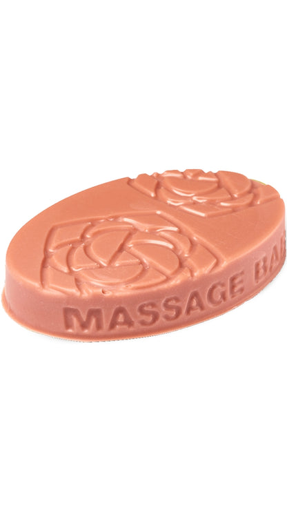 A red oval-shaped lush massage bar that smells like roses. 