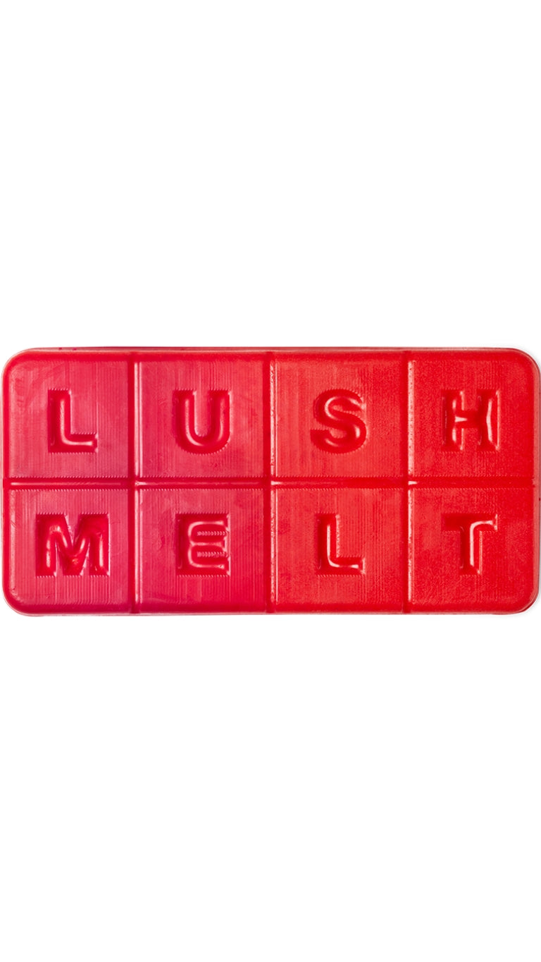 A red rectangular-shaped bath melt that smells like strawberries.