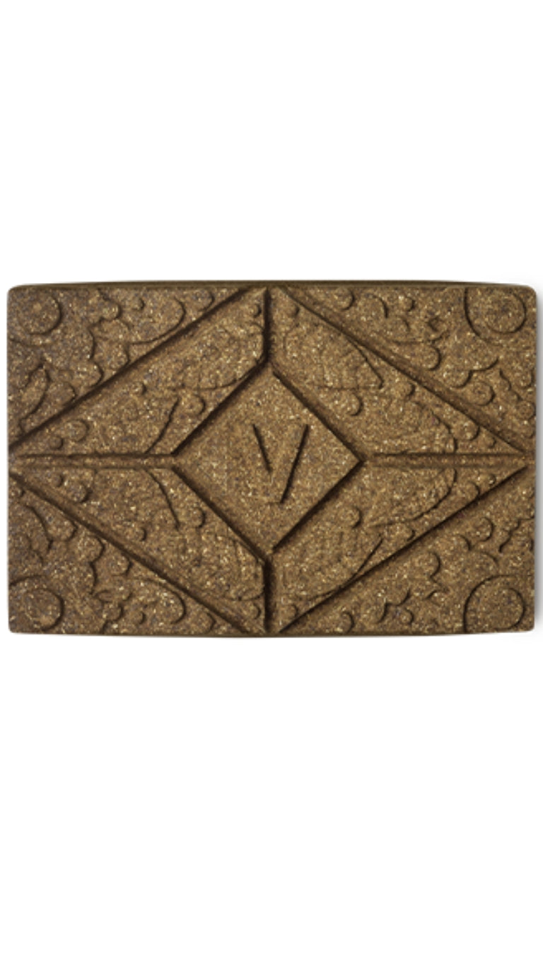 A brown rectangular block of lush henna hair dye. 
